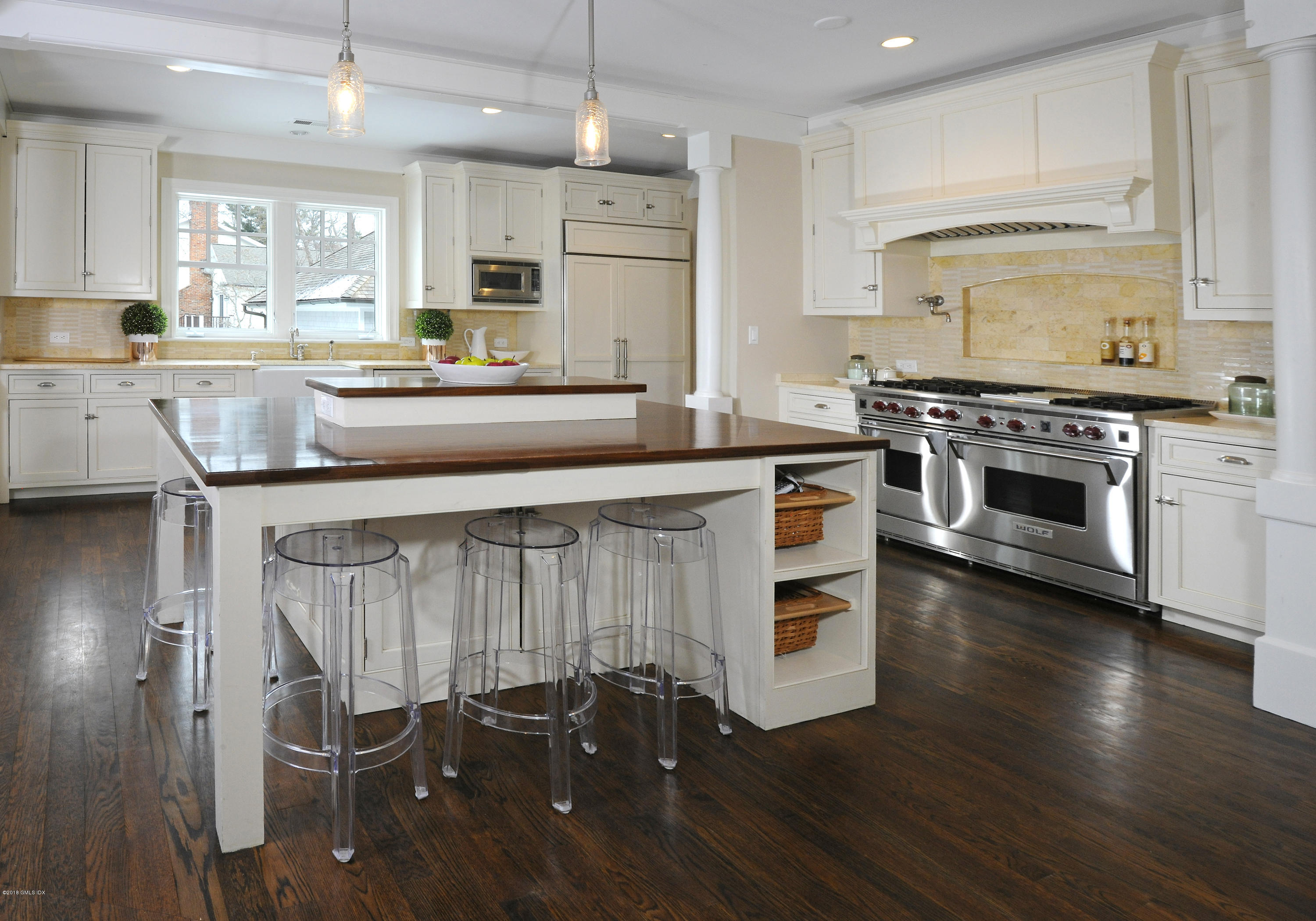12 Ledge Road Old Greenwich, CT 06870 - Photo 11 of 34 a kitchen with a stove a sink and a refrigerator