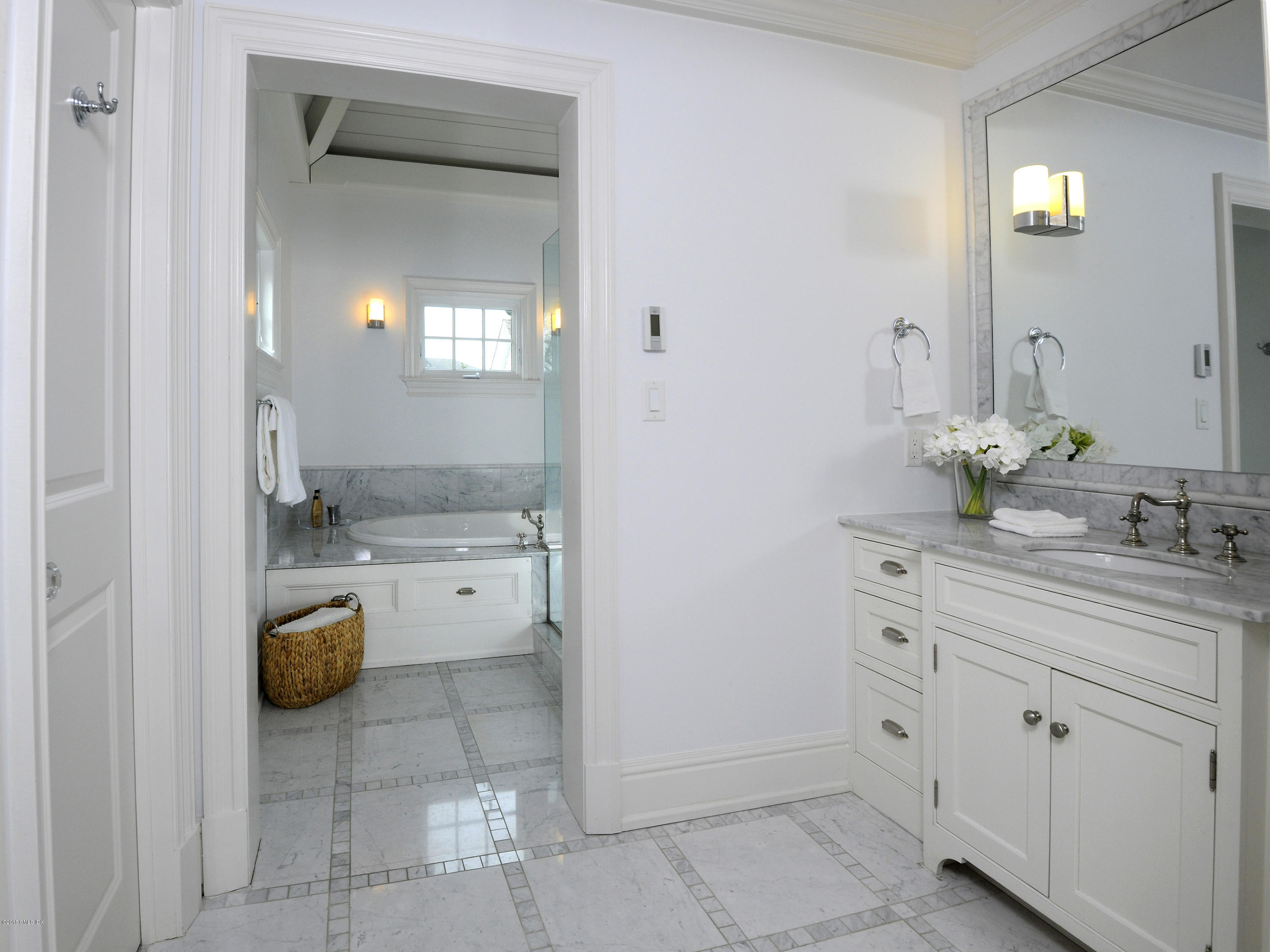 12 Ledge Road Old Greenwich, CT 06870 - Photo 16 of 34 a bathroom with a granite countertop sink a toilet and mirror