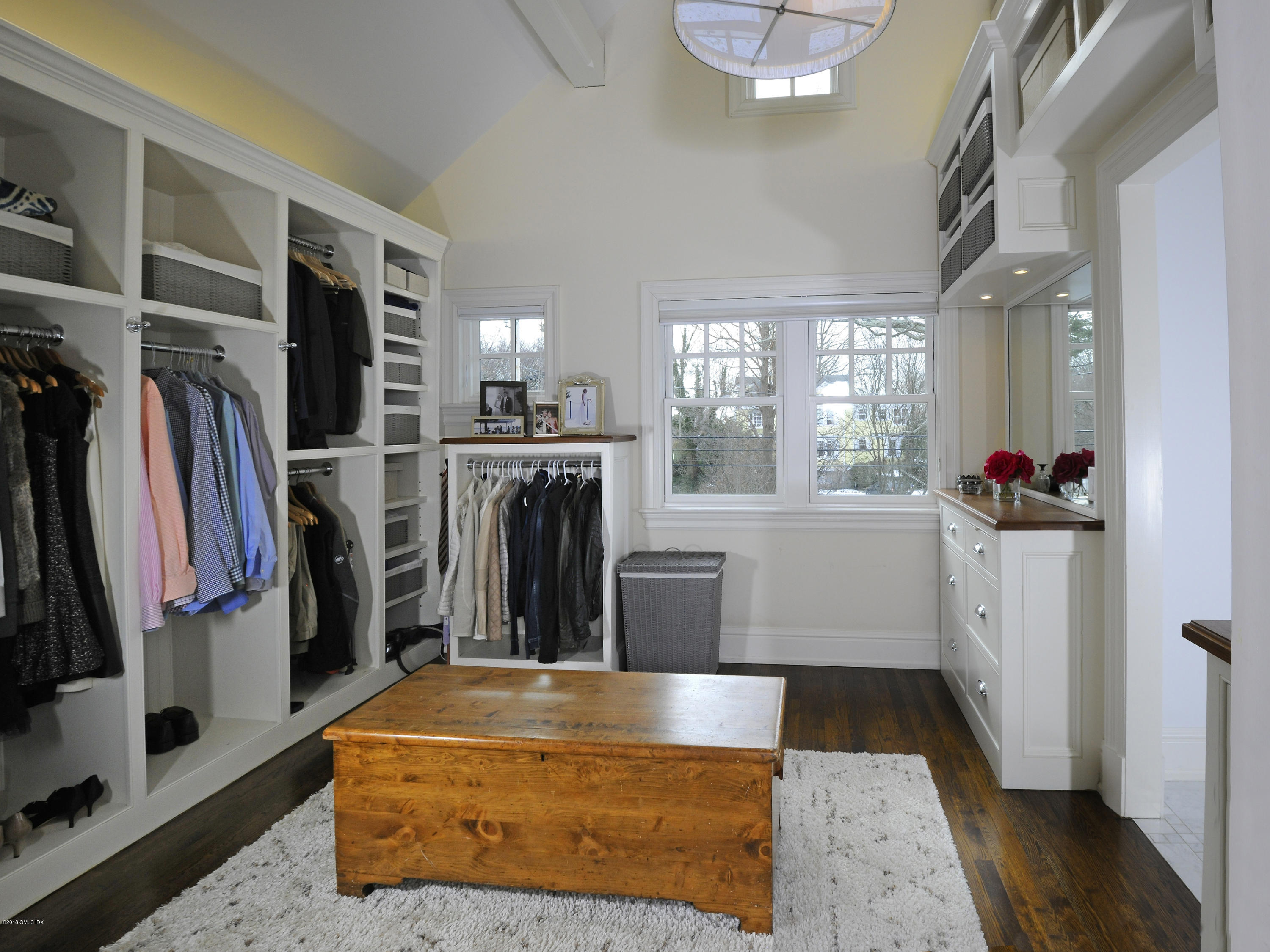 12 Ledge Road Old Greenwich, CT 06870 - Photo 17 of 34 a view of walk in closet with clothes and shoes