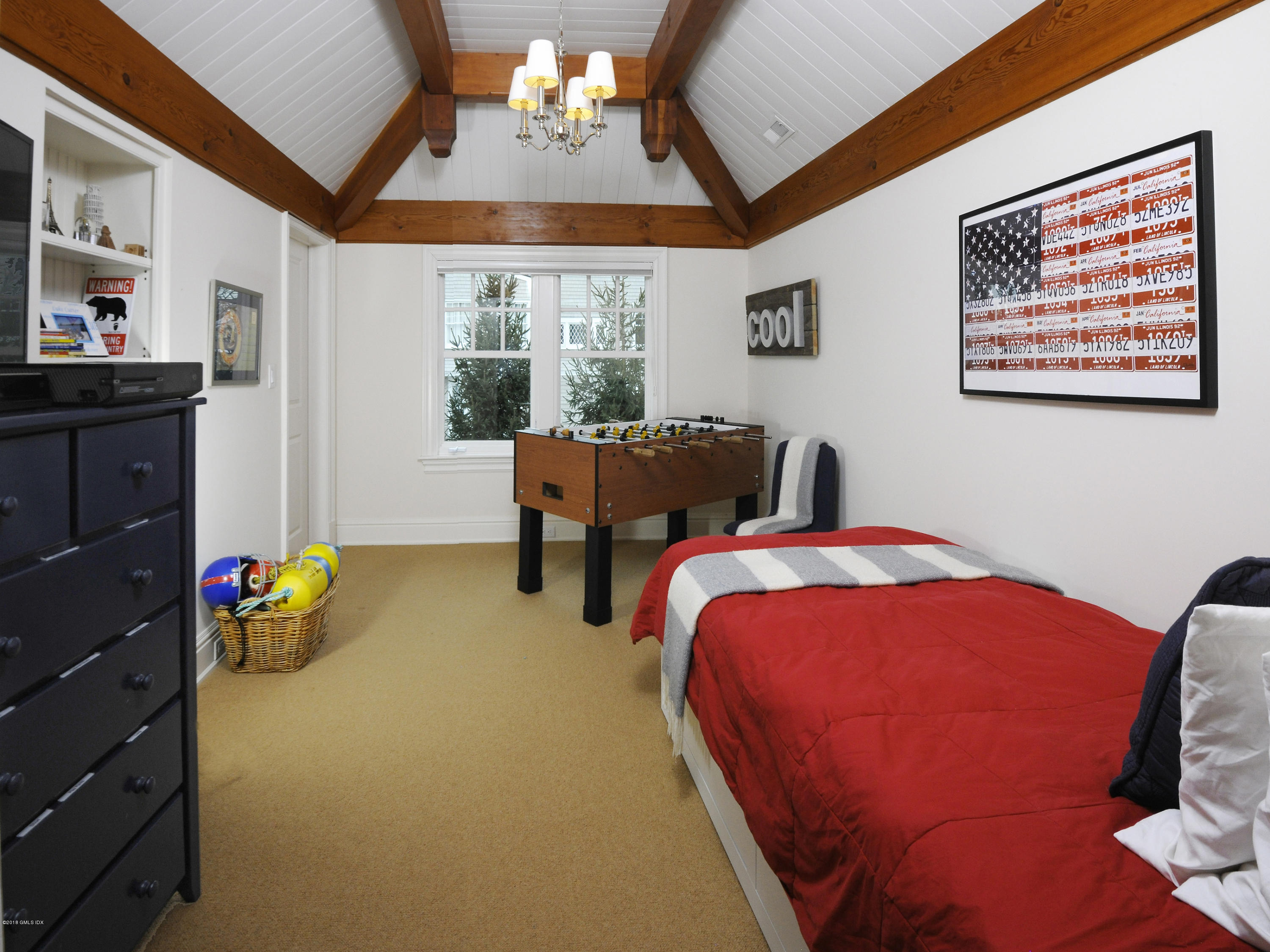 12 Ledge Road Old Greenwich, CT 06870 - Photo 19 of 34 a bedroom with furniture and a bed