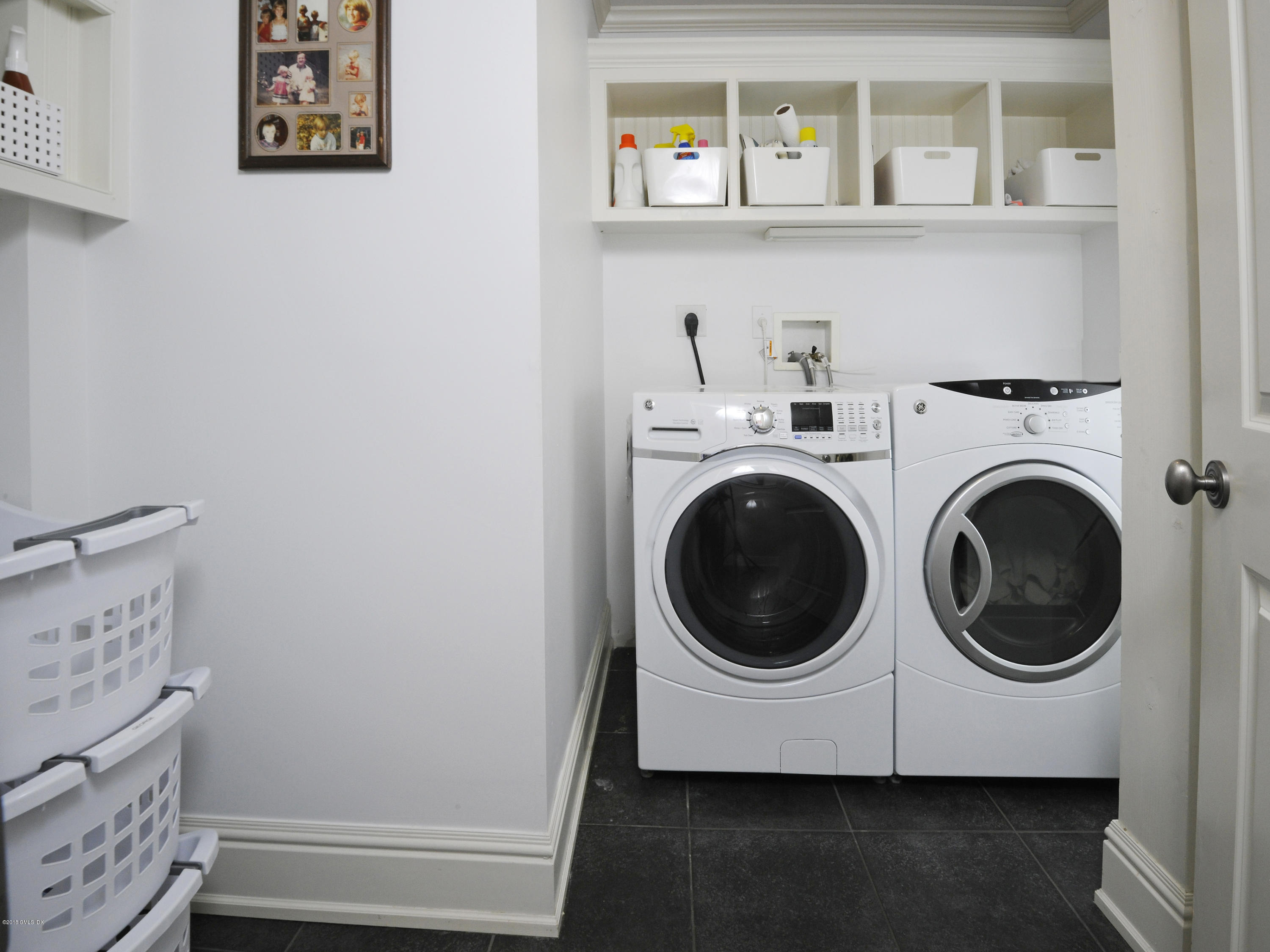 12 Ledge Road Old Greenwich, CT 06870 - Photo 24 of 34 a utility room with dryer and washer