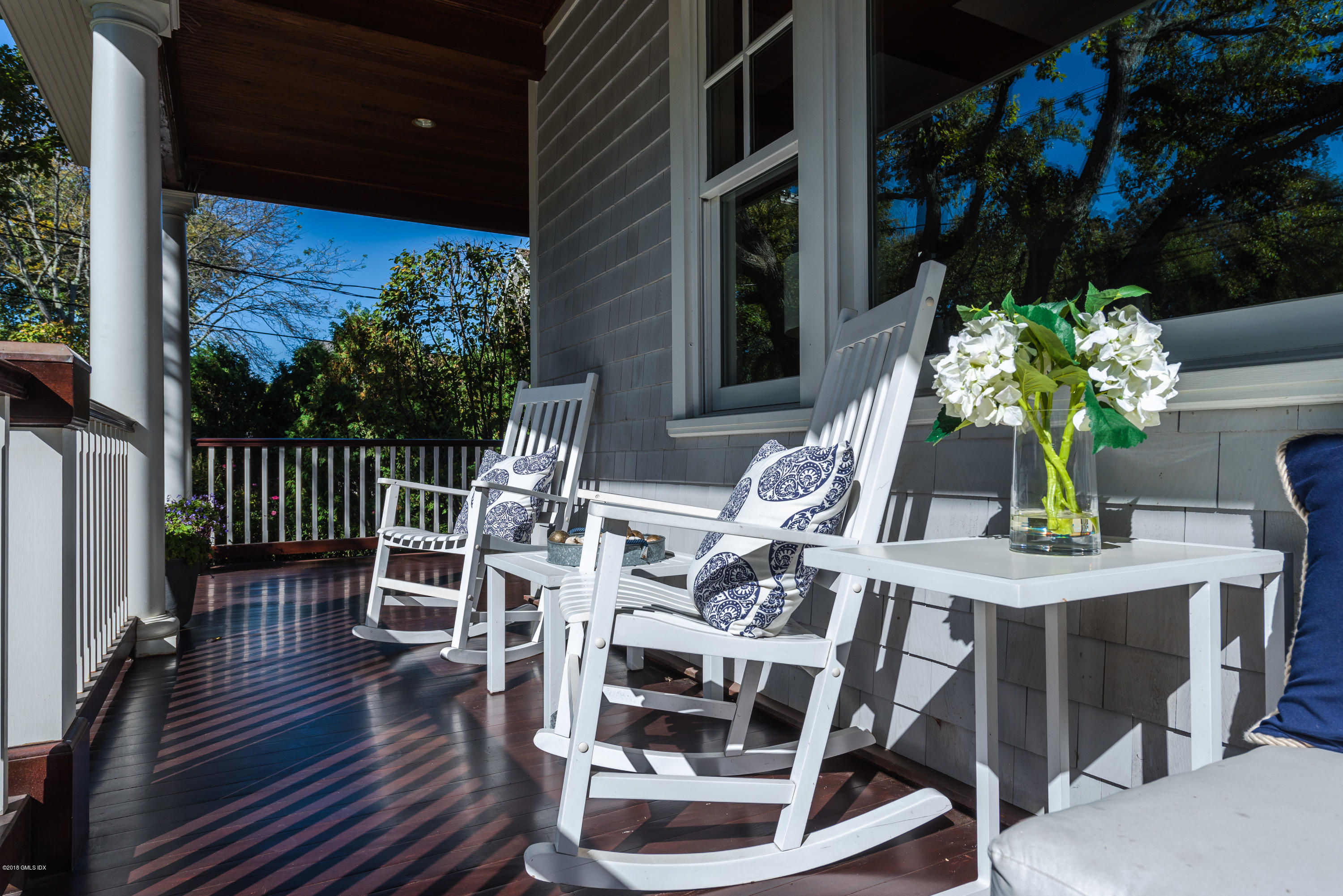12 Ledge Road Old Greenwich, CT 06870 - Photo 3 of 34 a view of a chairs and table on the wooden floor