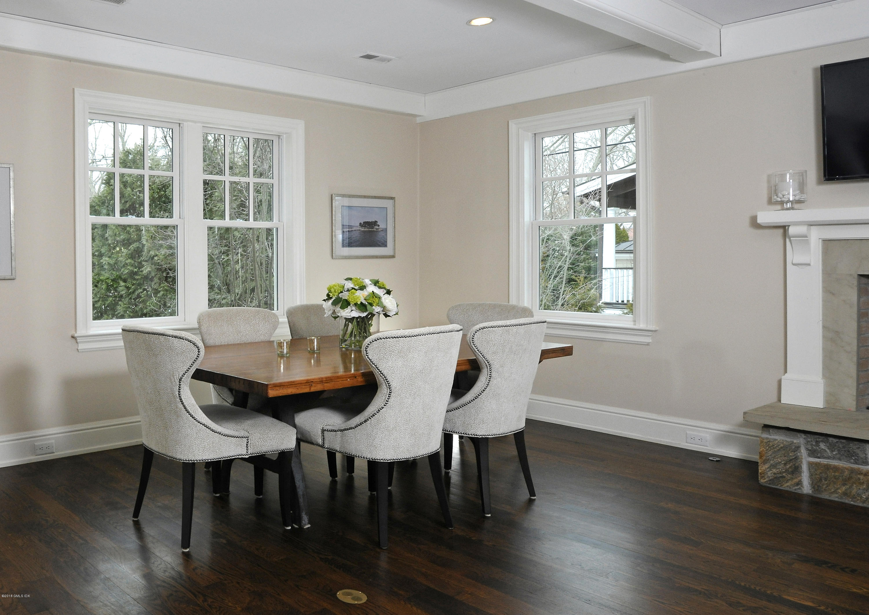 12 Ledge Road Old Greenwich, CT 06870 - Photo 10 of 34 a view of a dining room with furniture window and wooden floor