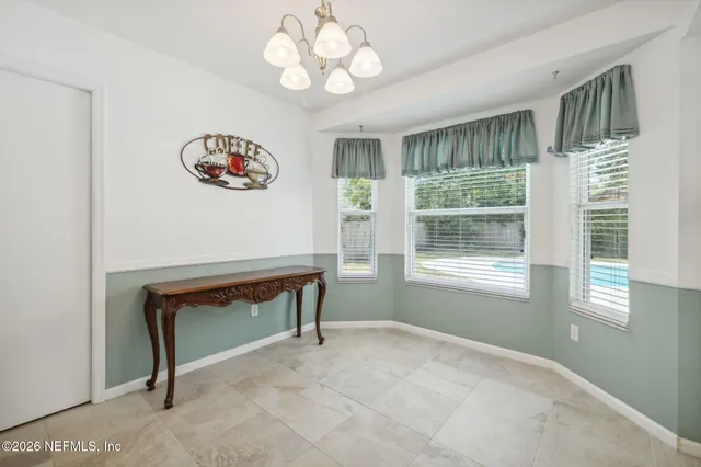 a view of a kitchen with granite countertop cabinets and a sink