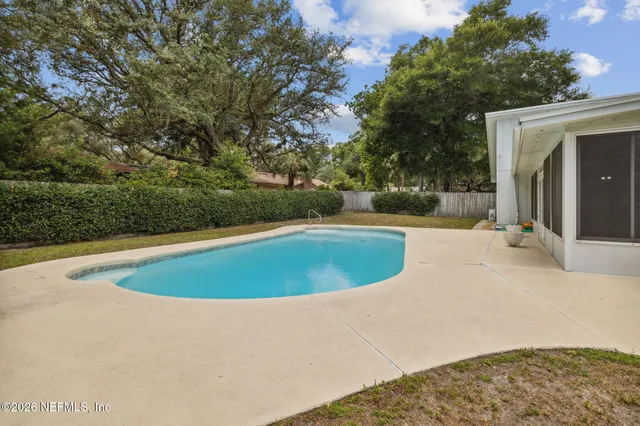 a house view with a backyard space