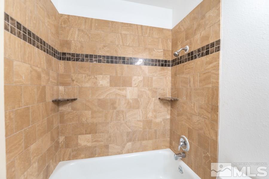 1355 Akard Drive Reno, NV 89503 - Photo 14 of 22 a bathroom with a shower and a shower