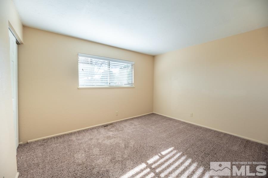 1355 Akard Drive Reno, NV 89503 - Photo 15 of 22 an empty room with windows