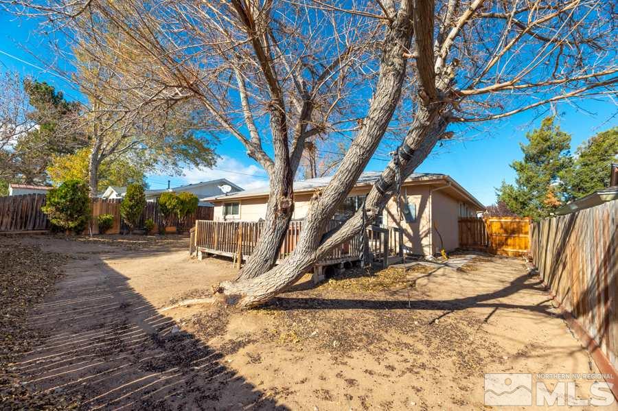 1355 Akard Drive Reno, NV 89503 - Photo 19 of 22 a view of a house with snow on the tree