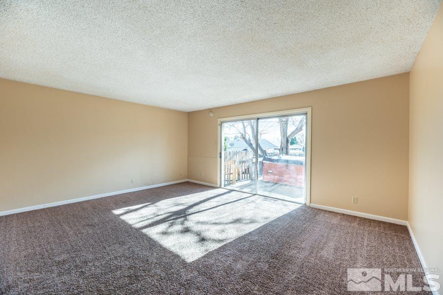 1355 Akard Drive Reno, NV 89503 - Photo 2 of 22 a view of an empty room and window