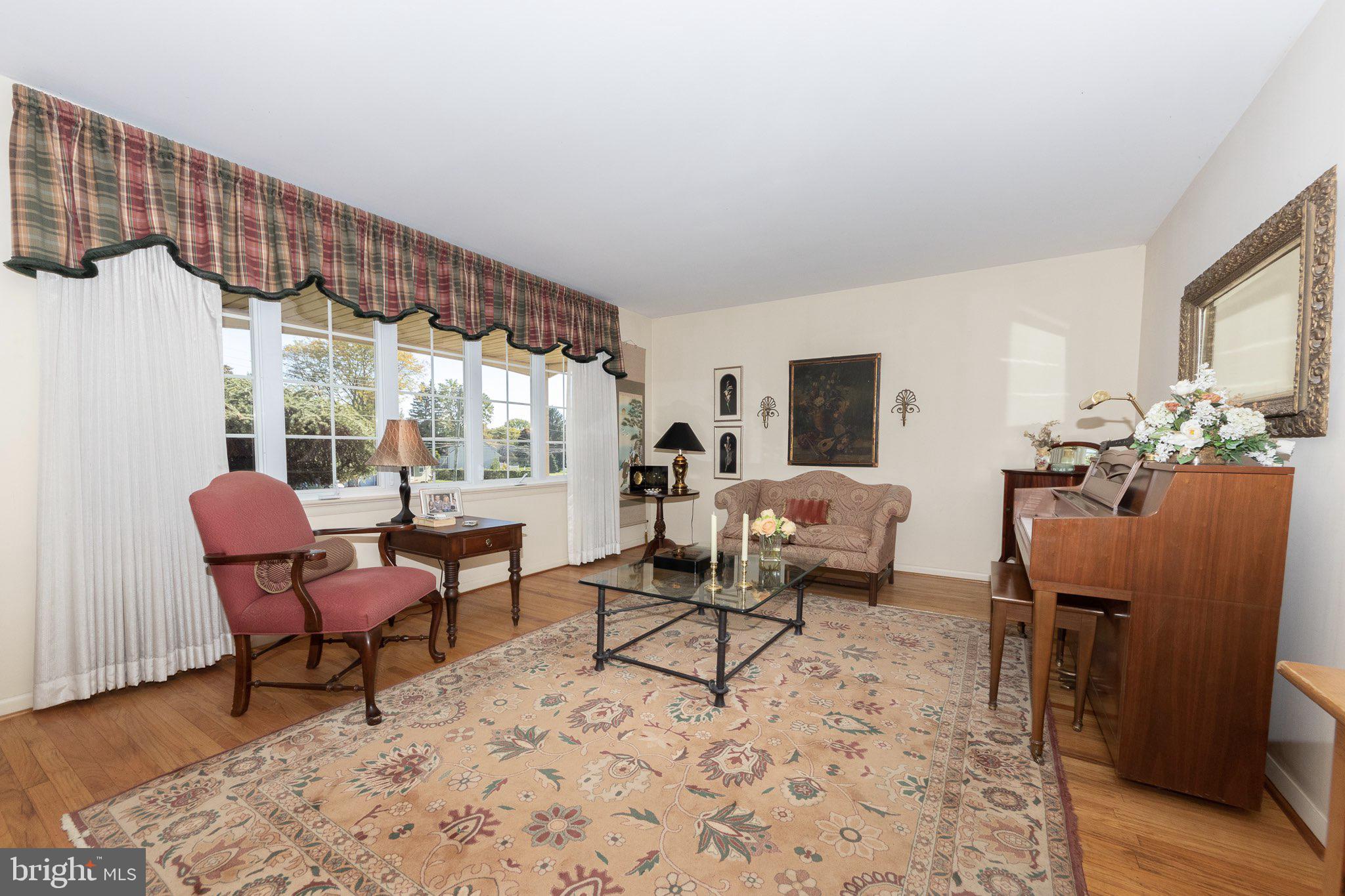 116 Bender Road Hatboro, PA 19040 - Photo 10 of 36 Living Room w/ large casement windows