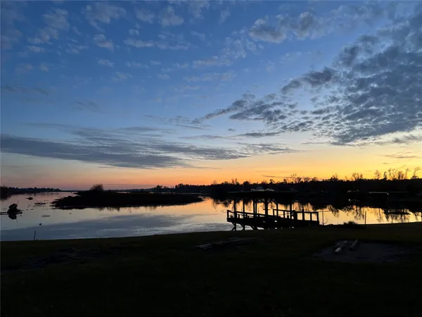 a view of a lake from a yard