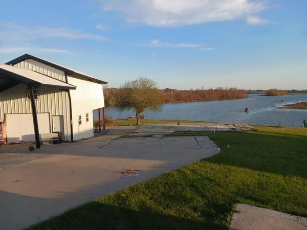 a view of a street with an ocean view