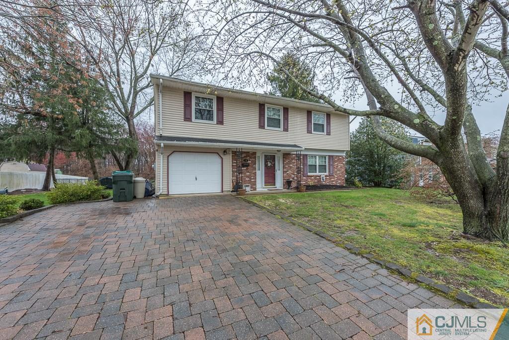 25 South Westfield Road Howell, NJ 07731 - Photo 2 of 22 a view of a house with a yard and large tree
