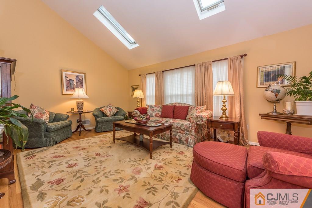 25 South Westfield Road Howell, NJ 07731 - Photo 16 of 22 a living room with furniture and a large window