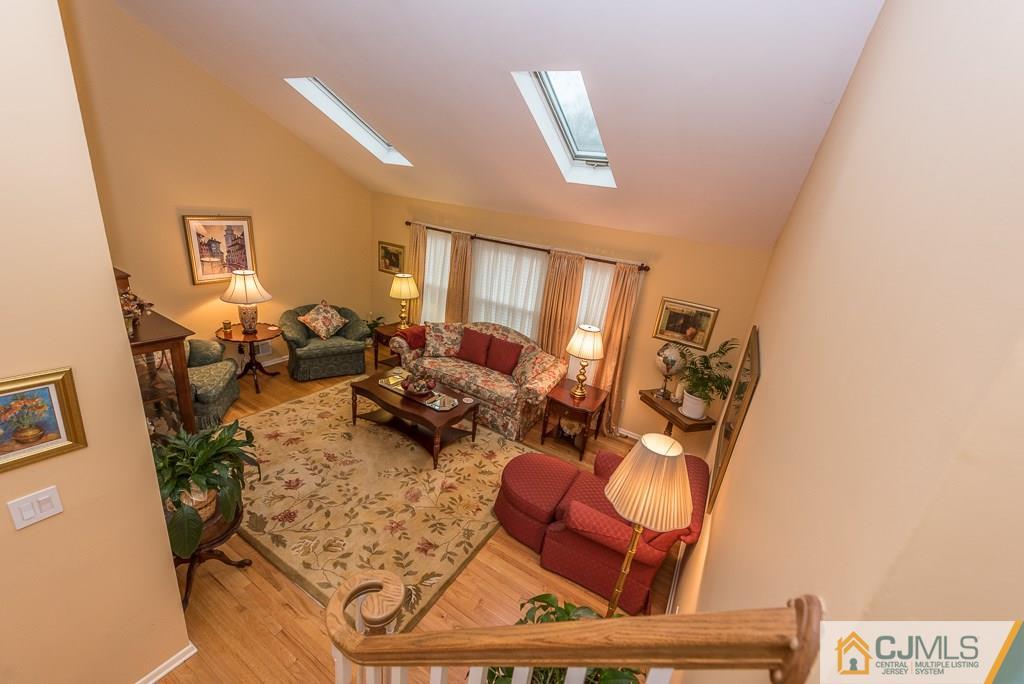 25 South Westfield Road Howell, NJ 07731 - Photo 17 of 22 a living room with furniture and a window