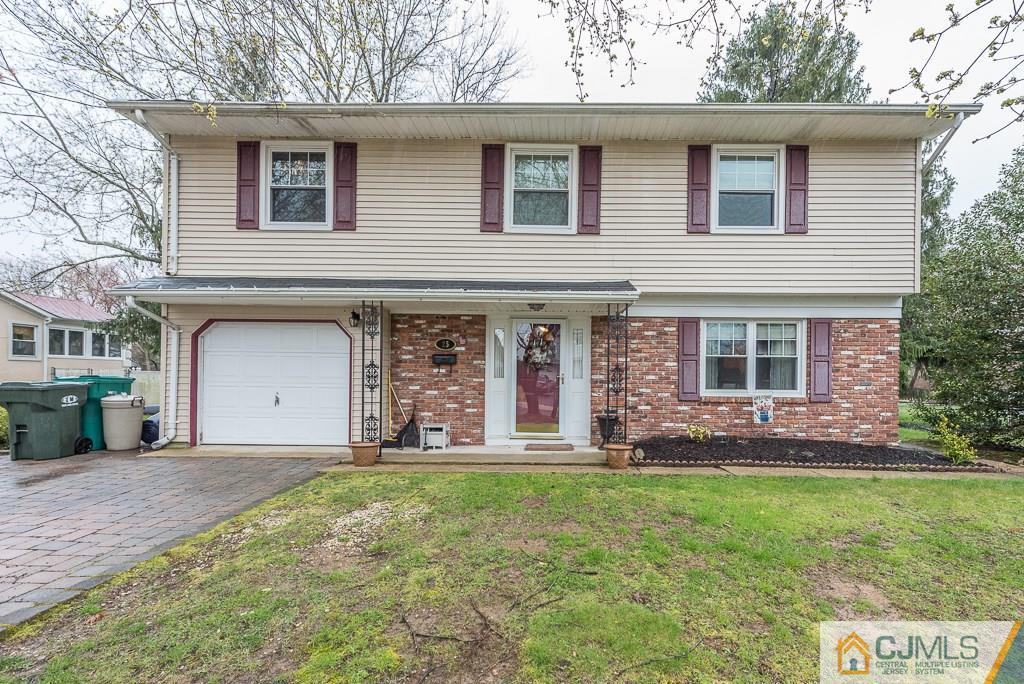 25 South Westfield Road Howell, NJ 07731 - Photo 3 of 22 a front view of house with yard