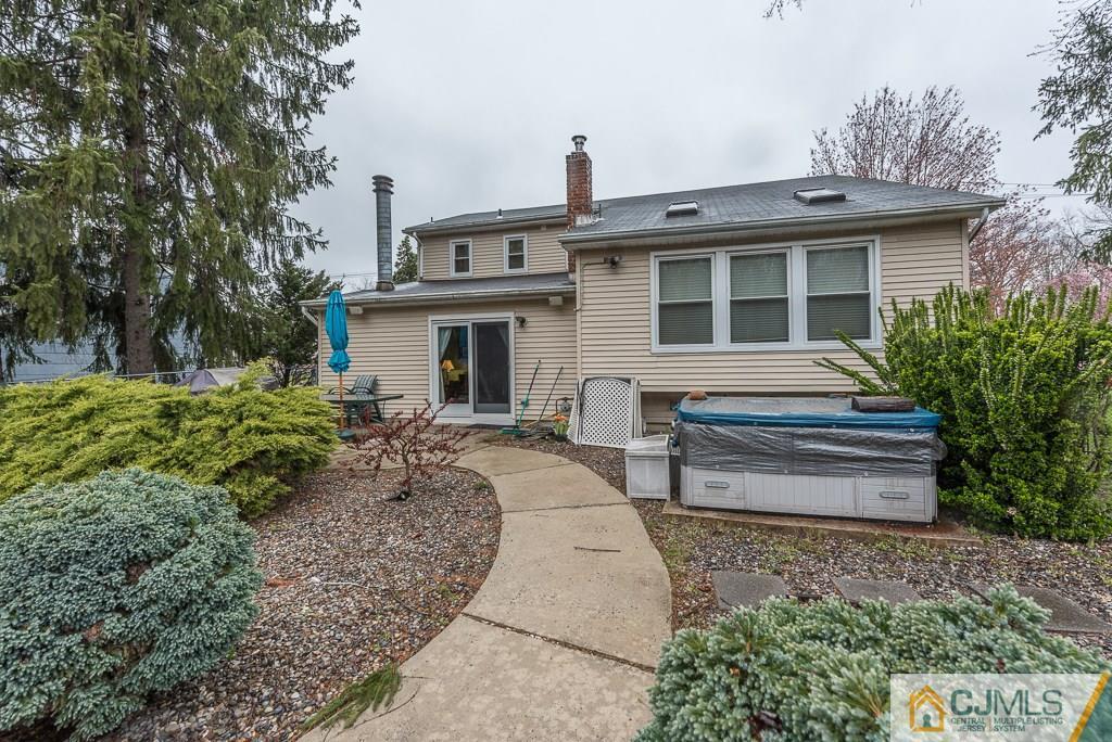 25 South Westfield Road Howell, NJ 07731 - Photo 22 of 22 a front view of a house with garden