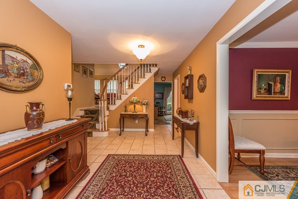 25 South Westfield Road Howell, NJ 07731 - Photo 5 of 22 a view of a hallway with seating area