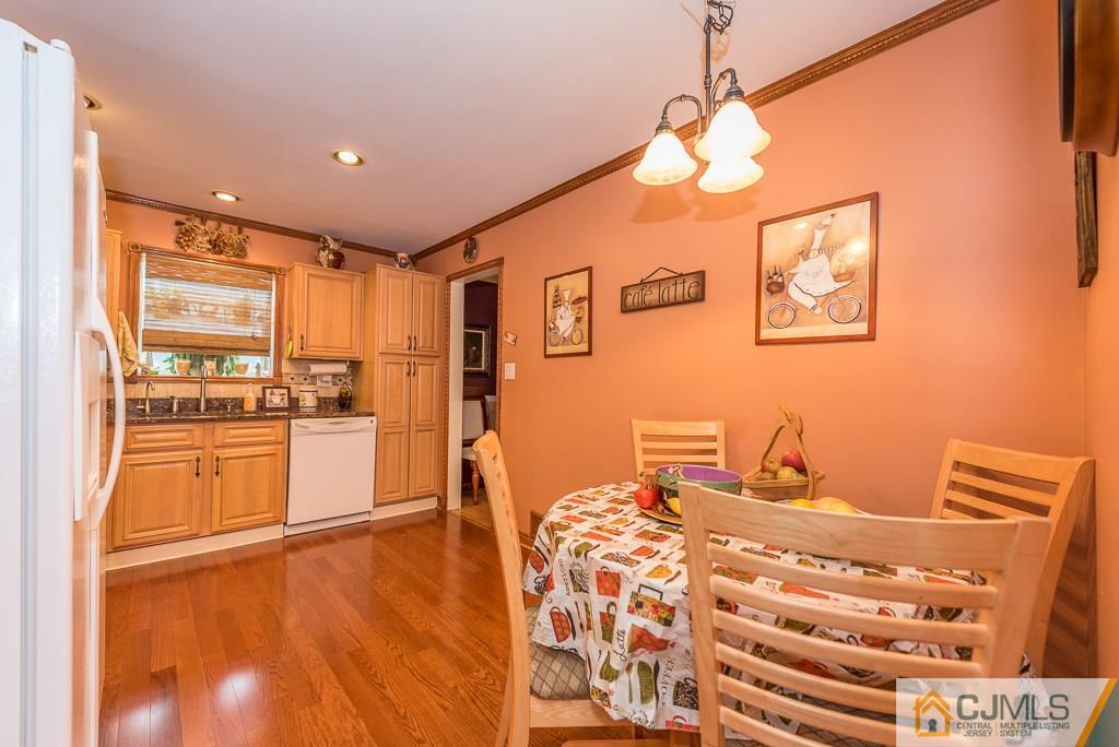 25 South Westfield Road Howell, NJ 07731 - Photo 8 of 22 a bedroom with a bed and wooden floor
