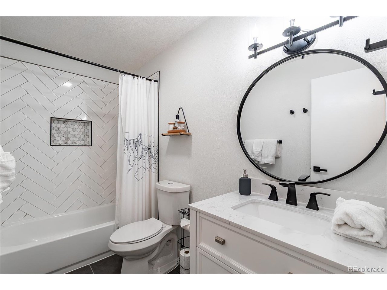 400 Hi Country Drive, Unit 15 Winter Park, CO 80482 - Photo 15 of 35 Renovated and bright modern bathroom