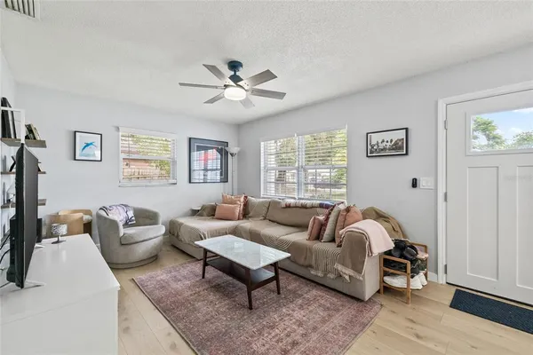 a living room with furniture and a window