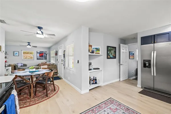 a view of a kitchen and dining room