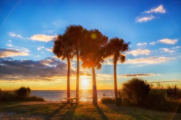 a sunset view with ocean view