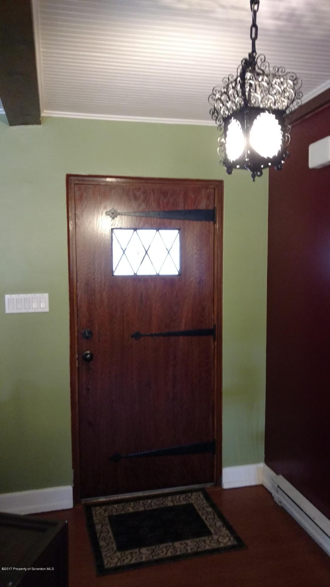 110 Hillcrest Road Moscow, PA 18444 - Photo 6 of 19 a view of a entryway door with wooden floor