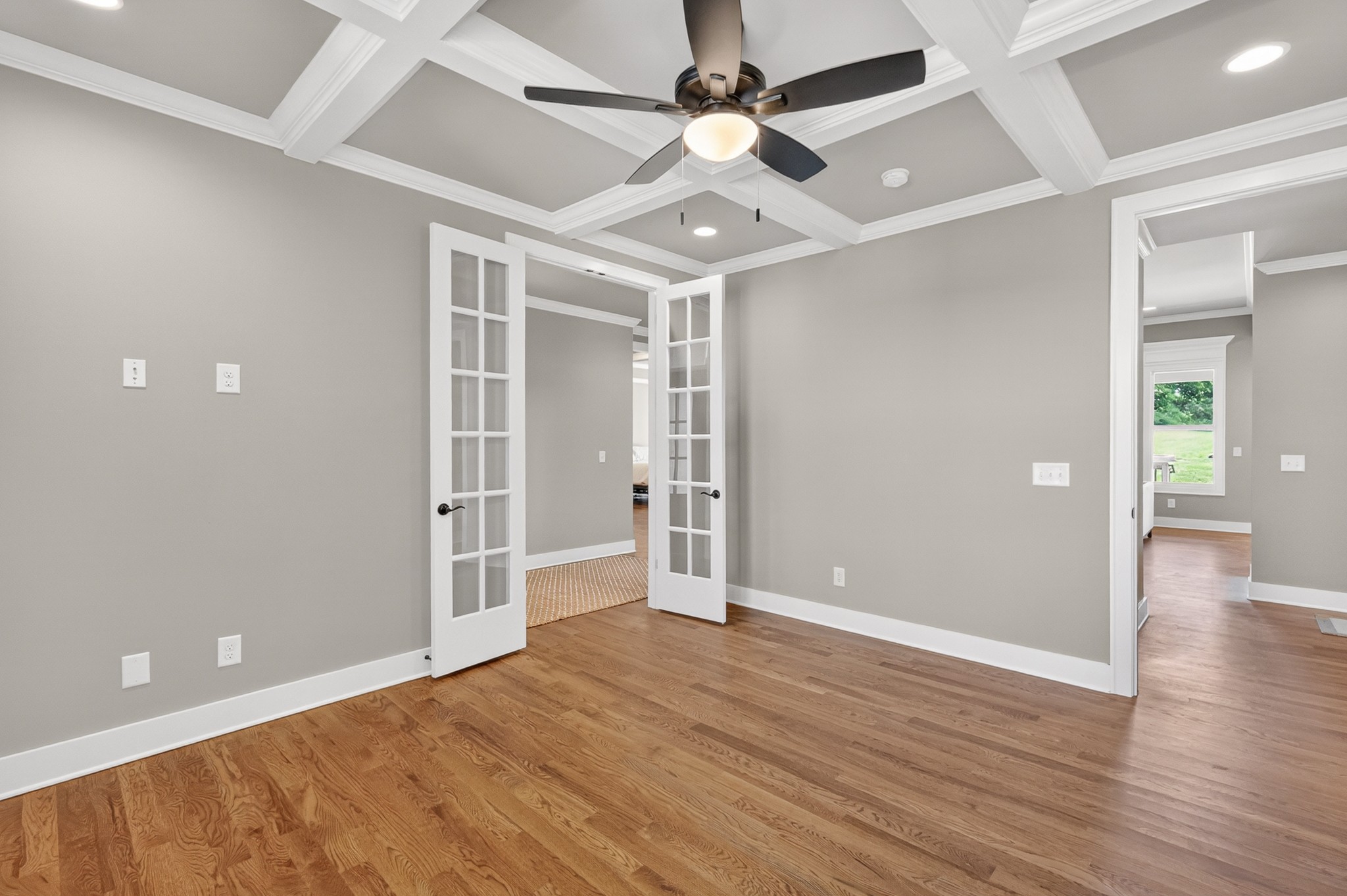 1176 Iron Bridge Road Columbia, TN 38401 - Photo 26 of 53 wooden floor in an empty room with a fan
