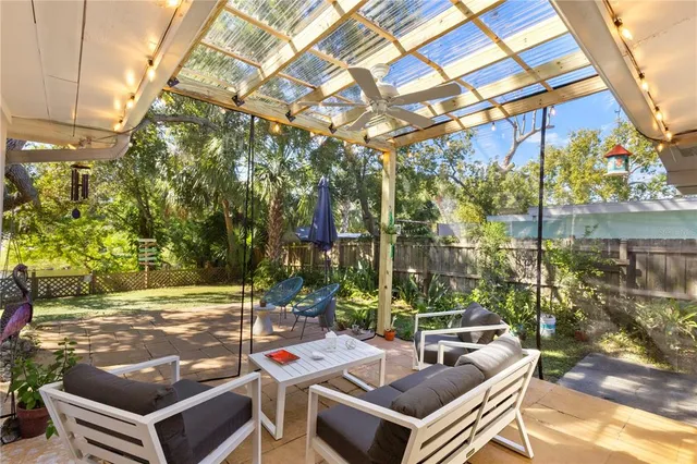 a view of yard with patio