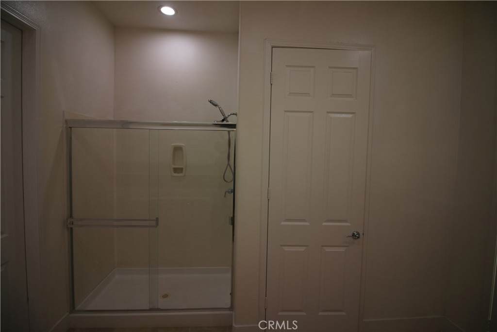 805 Annandale Road Beaumont, CA 92223 - Photo 15 of 39 a bathroom with a shower