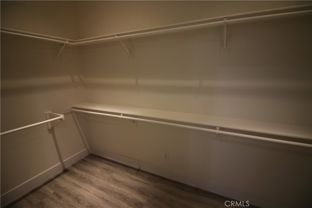 805 Annandale Road Beaumont, CA 92223 - Photo 16 of 39 a view of a room with racks on the wall