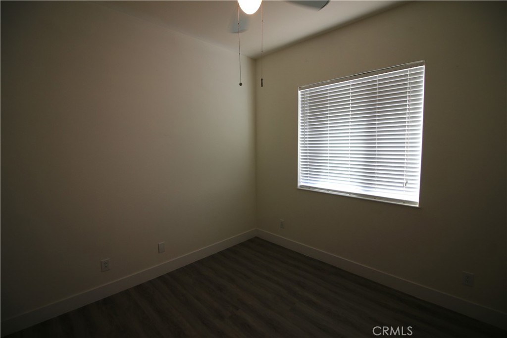 805 Annandale Road Beaumont, CA 92223 - Photo 23 of 39 an empty room with a window