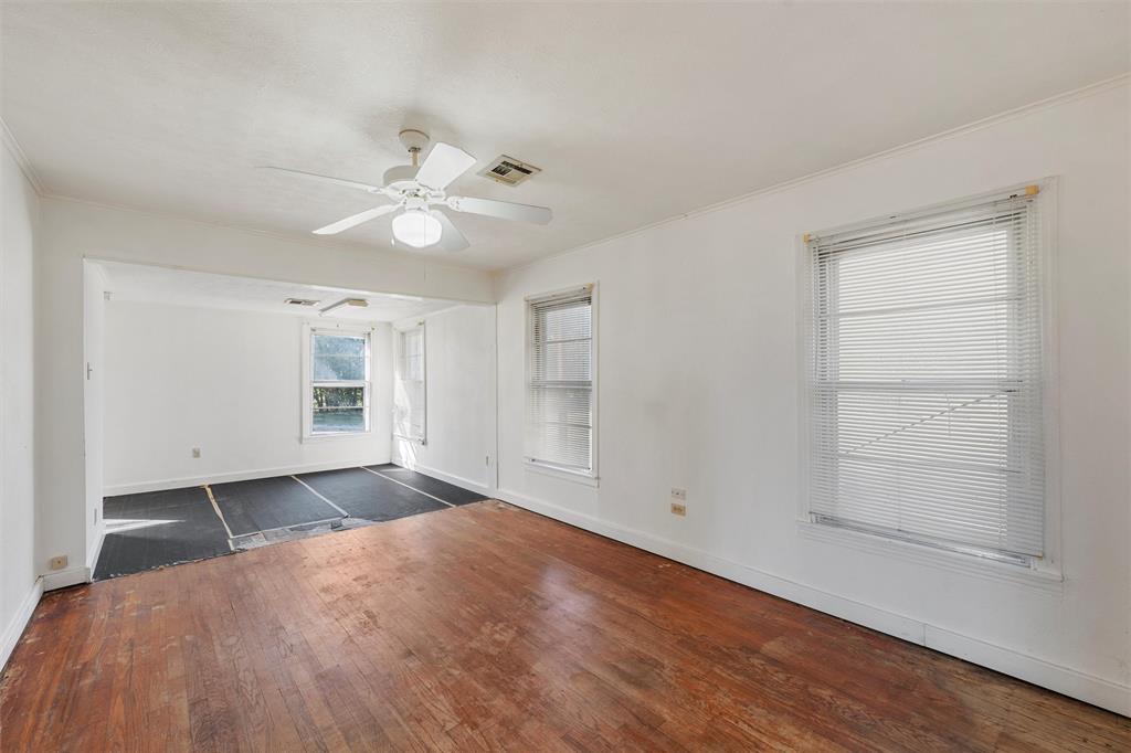 12145 Tree Lake Drive Waco, TX 76708 - Photo 17 of 40 wooden floor in an empty room with a window