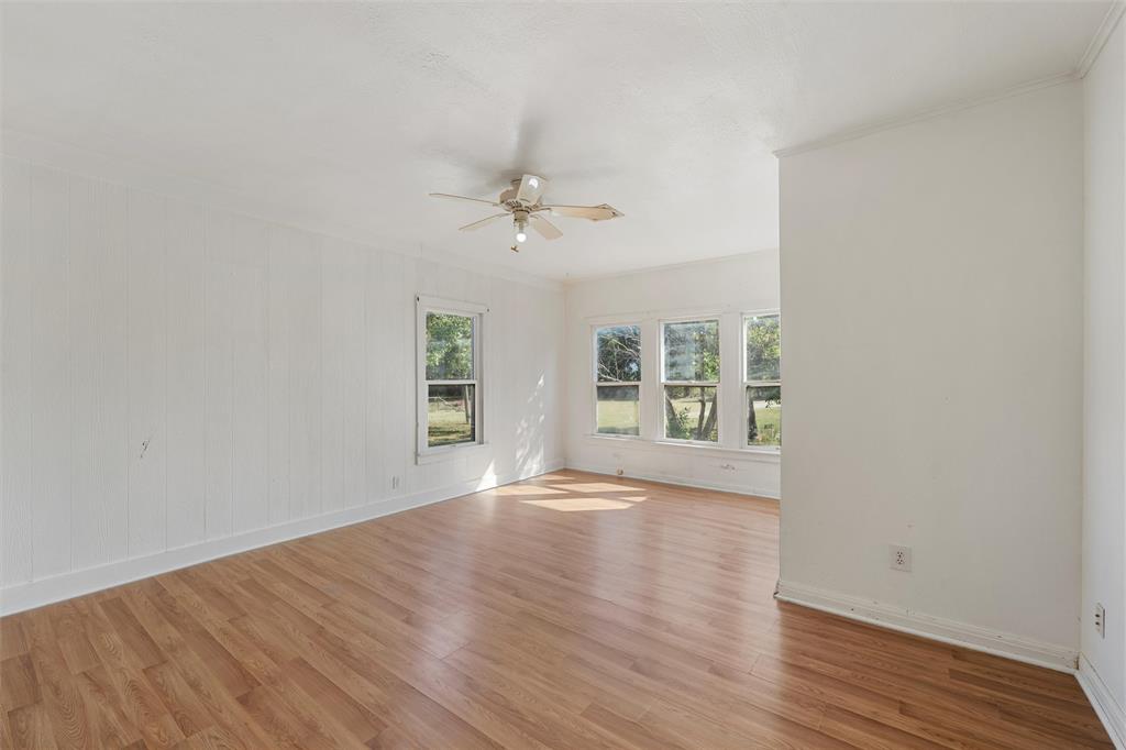 12145 Tree Lake Drive Waco, TX 76708 - Photo 22 of 40 wooden floor in an empty room with a window
