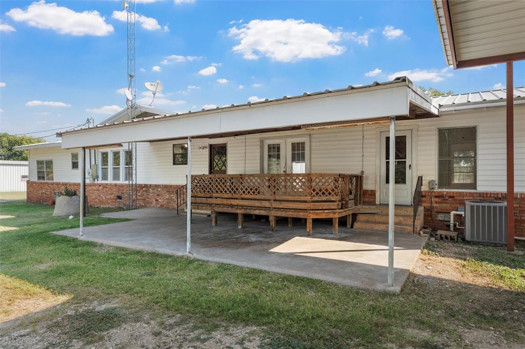 12145 Tree Lake Drive Waco, TX 76708 - Photo 28 of 40 a house view with a sitting space and garden space