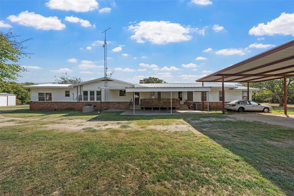12145 Tree Lake Drive Waco, TX 76708 - Photo 29 of 40 a front view of a house with a garden