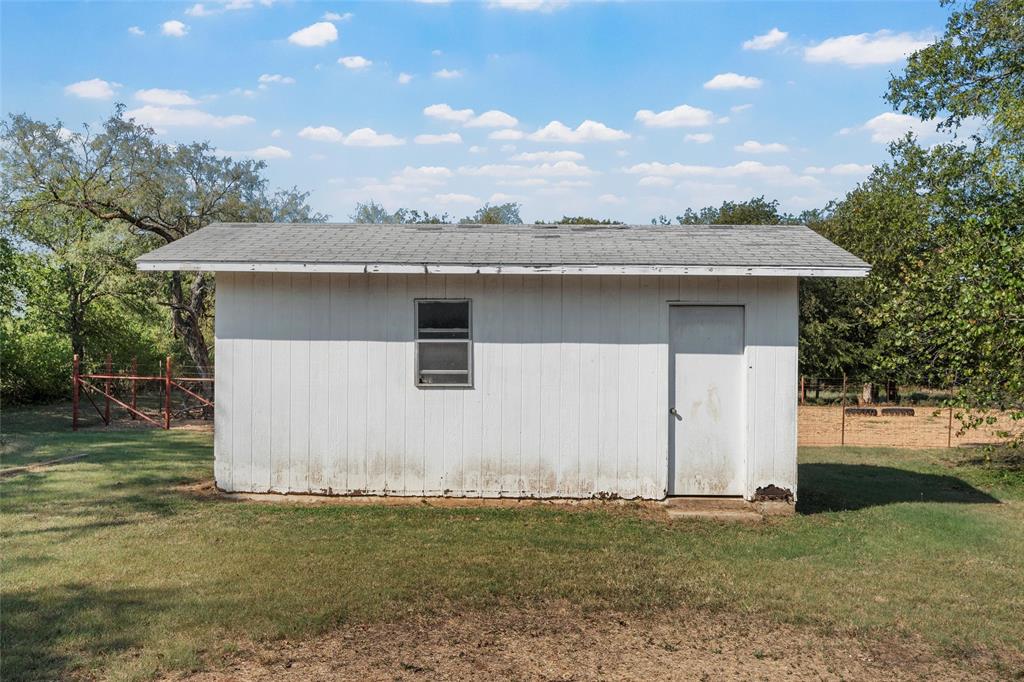 12145 Tree Lake Drive Waco, TX 76708 - Photo 30 of 40 a front view of a house with garden
