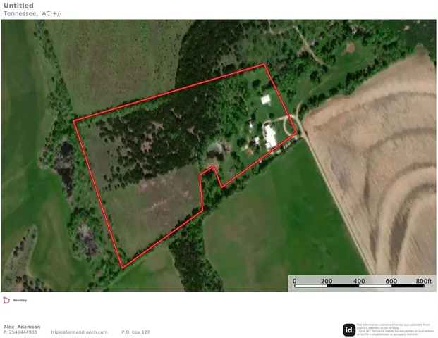 a black and white photo of a couple of people on a street