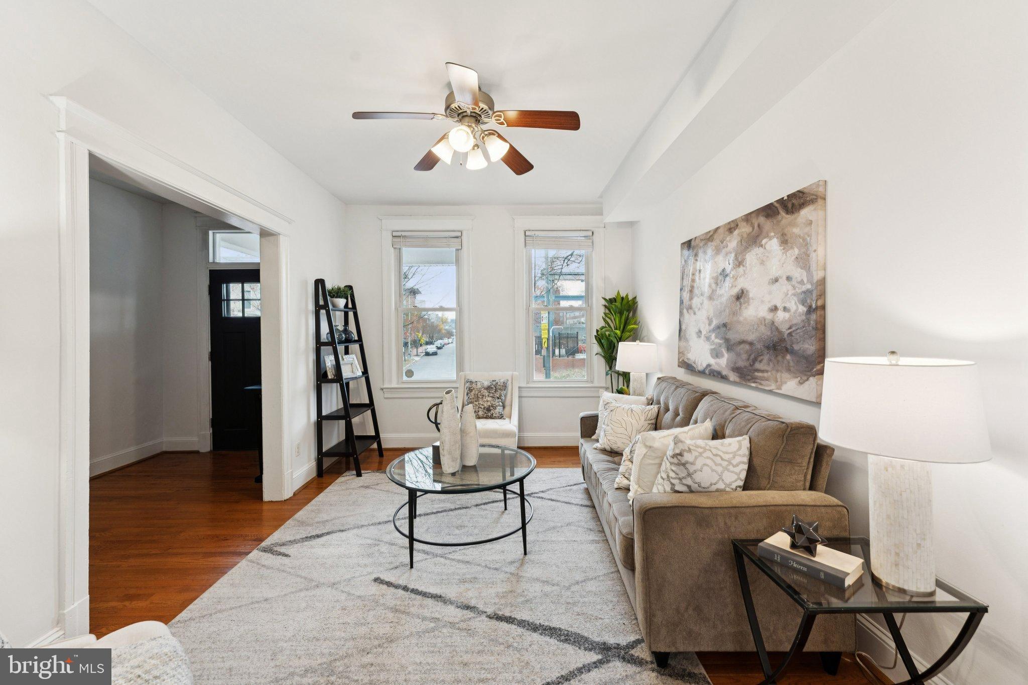 2215 2nd Street Northwest Washington, DC 20001 - Photo 5 of 34 a living room with furniture and wooden floor