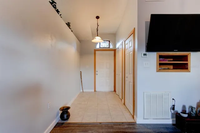 a very nice looking room with a flat screen tv