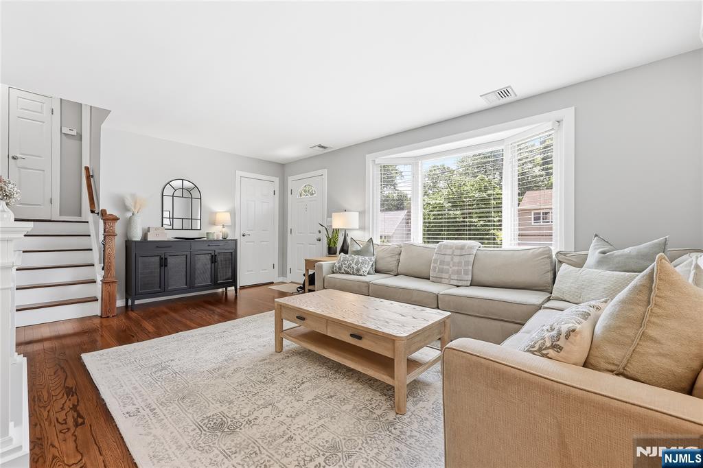 77 White Pond Road Waldwick, NJ 07463 - Photo 8 of 33 a living room with furniture and a flat screen tv