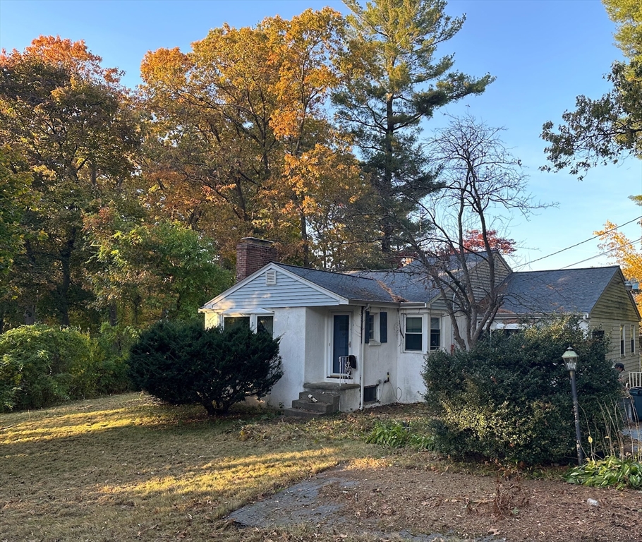 9 Cypress Road Natick, MA 01760 - Photo 1 of 1 a view of a house with garden