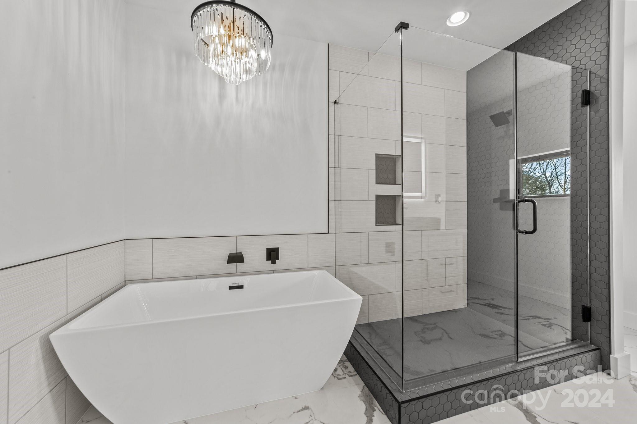 9288 Sherrills Ford Road Terrell, NC 28682 - Photo 20 of 47 a bathroom with a bathtub and a shower