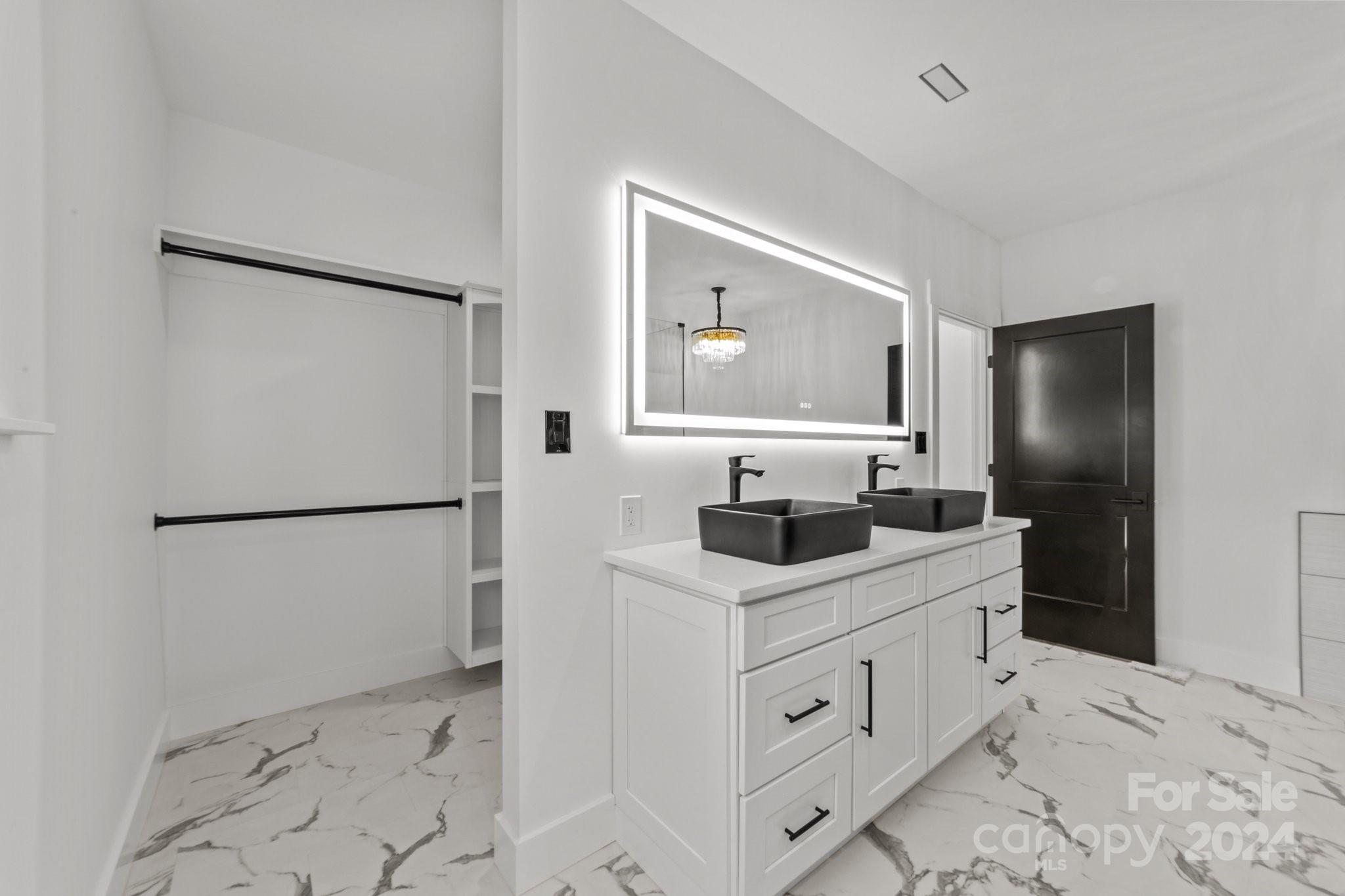 9288 Sherrills Ford Road Terrell, NC 28682 - Photo 24 of 47 a kitchen with white cabinets and refrigerator