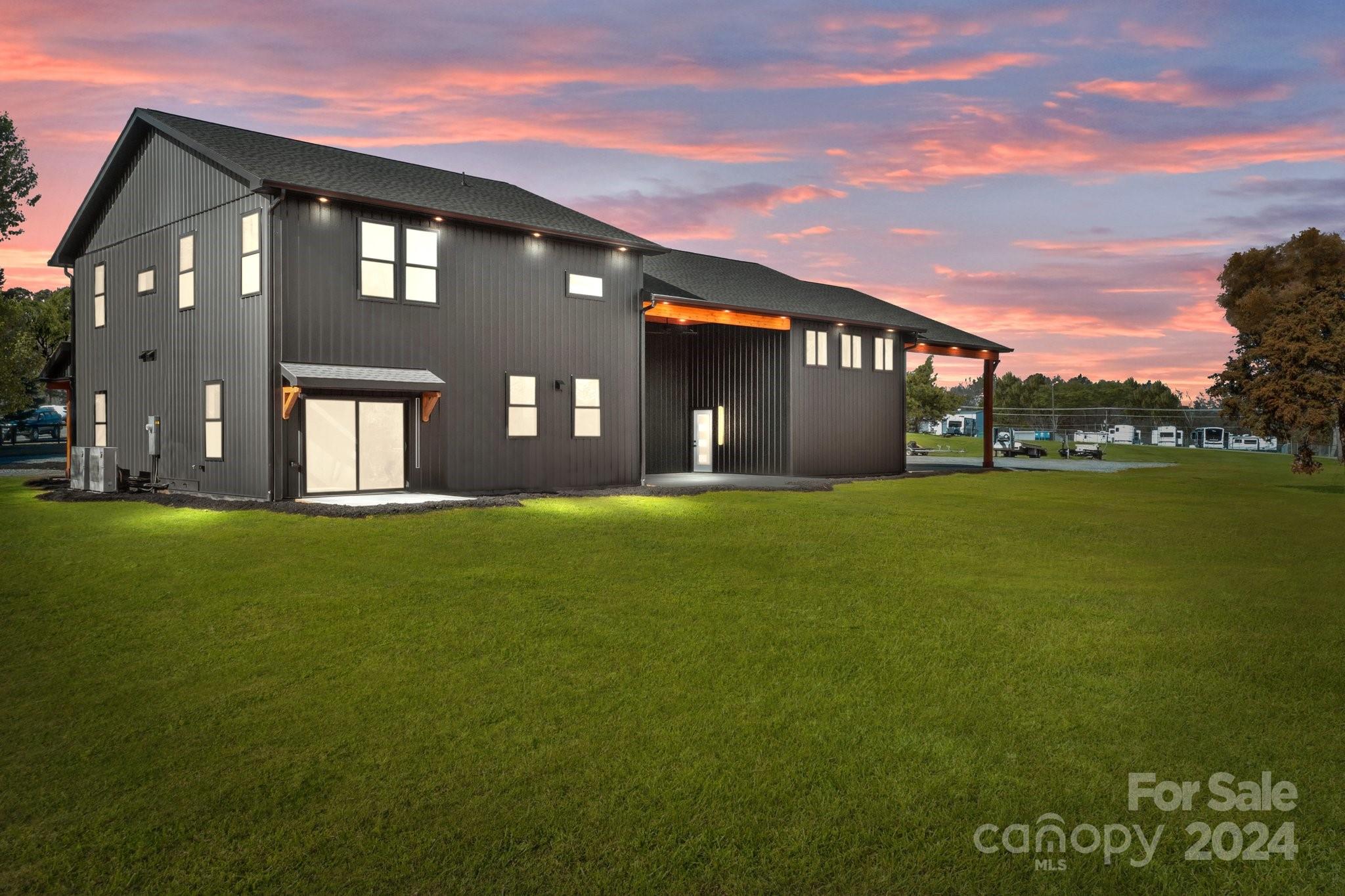 9288 Sherrills Ford Road Terrell, NC 28682 - Photo 3 of 47 a front view of a house with a garden
