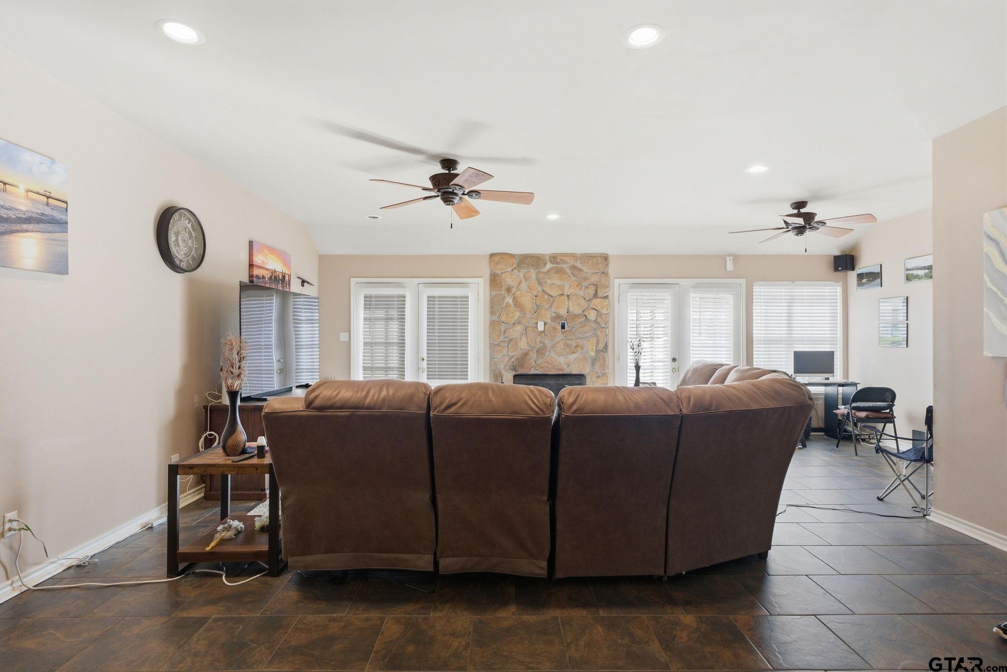 2301 McDonald Road Tyler, TX 75701 - Photo 3 of 26 a living room with furniture and windows