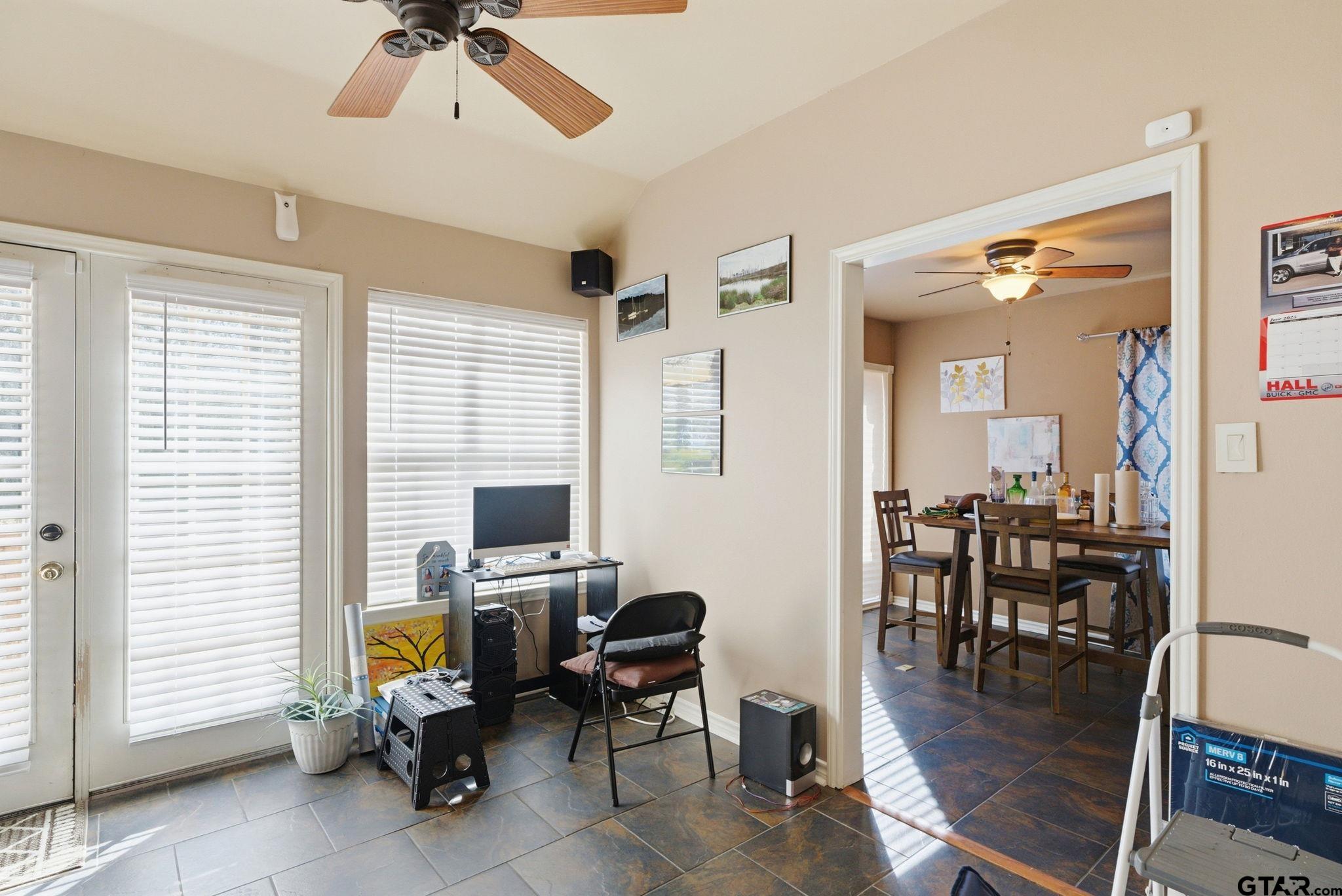 2301 McDonald Road Tyler, TX 75701 - Photo 6 of 26 a view of a livingroom with workspace and a window