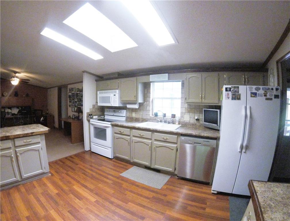 1045 Stickle Road Portersville, PA 16051 - Photo 2 of 25 The skylight is a nice touch to this already light & bright kitchen...
