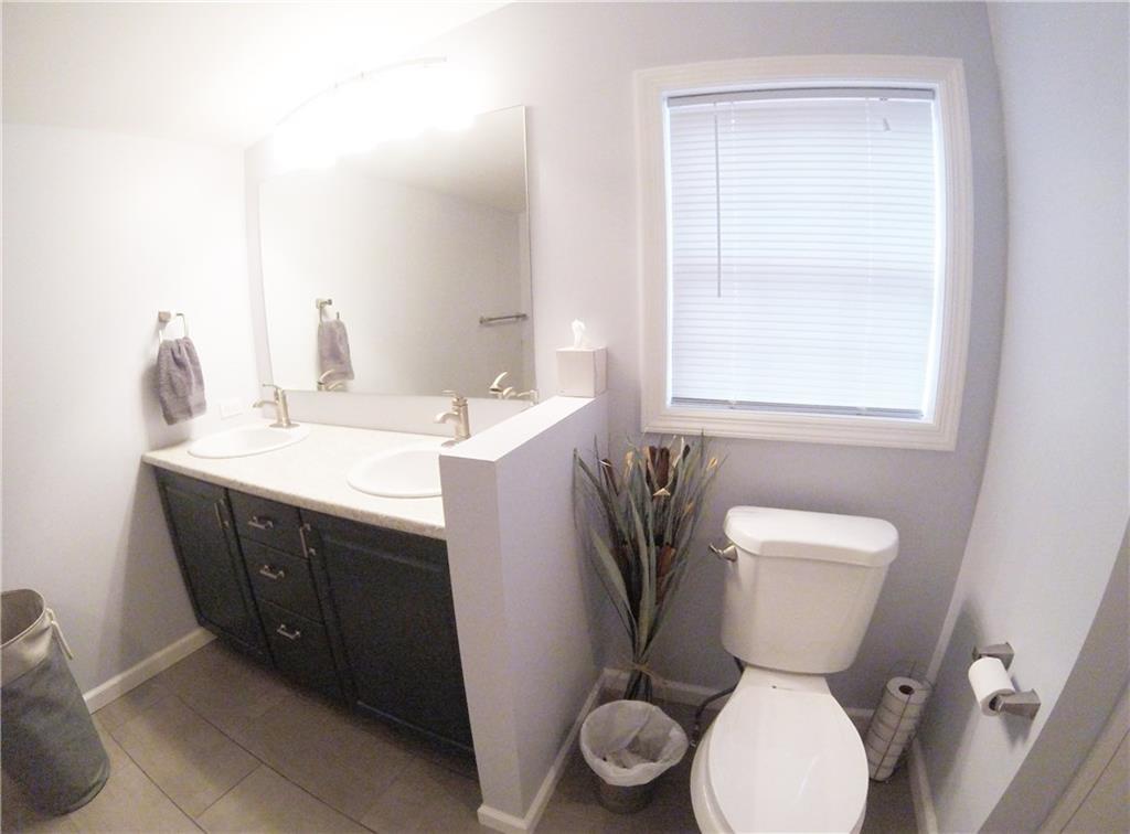 1045 Stickle Road Portersville, PA 16051 - Photo 12 of 25 The beautifully-remodeled bathroom is the definition of serene!